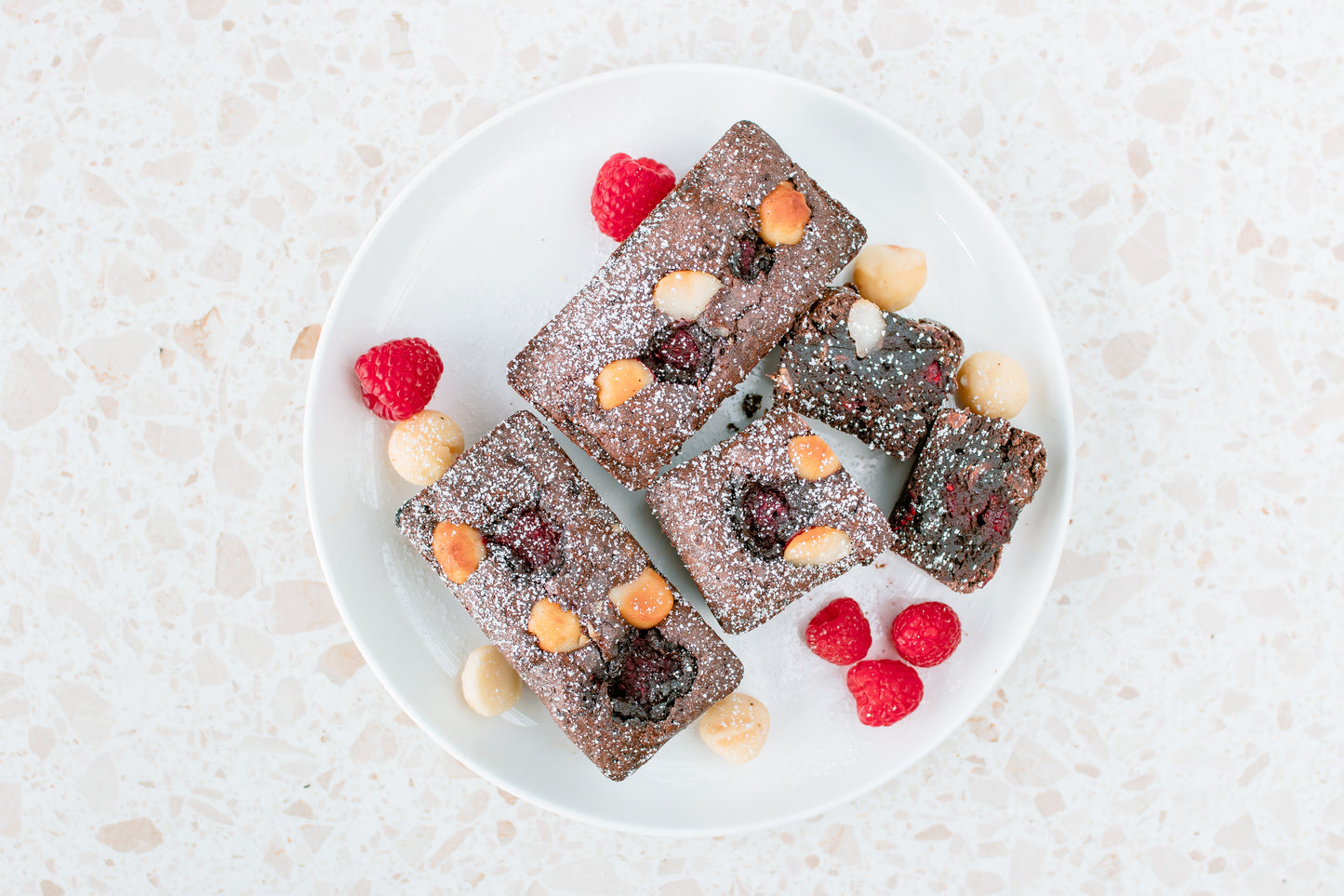 brownie with rasberries and macadamias
