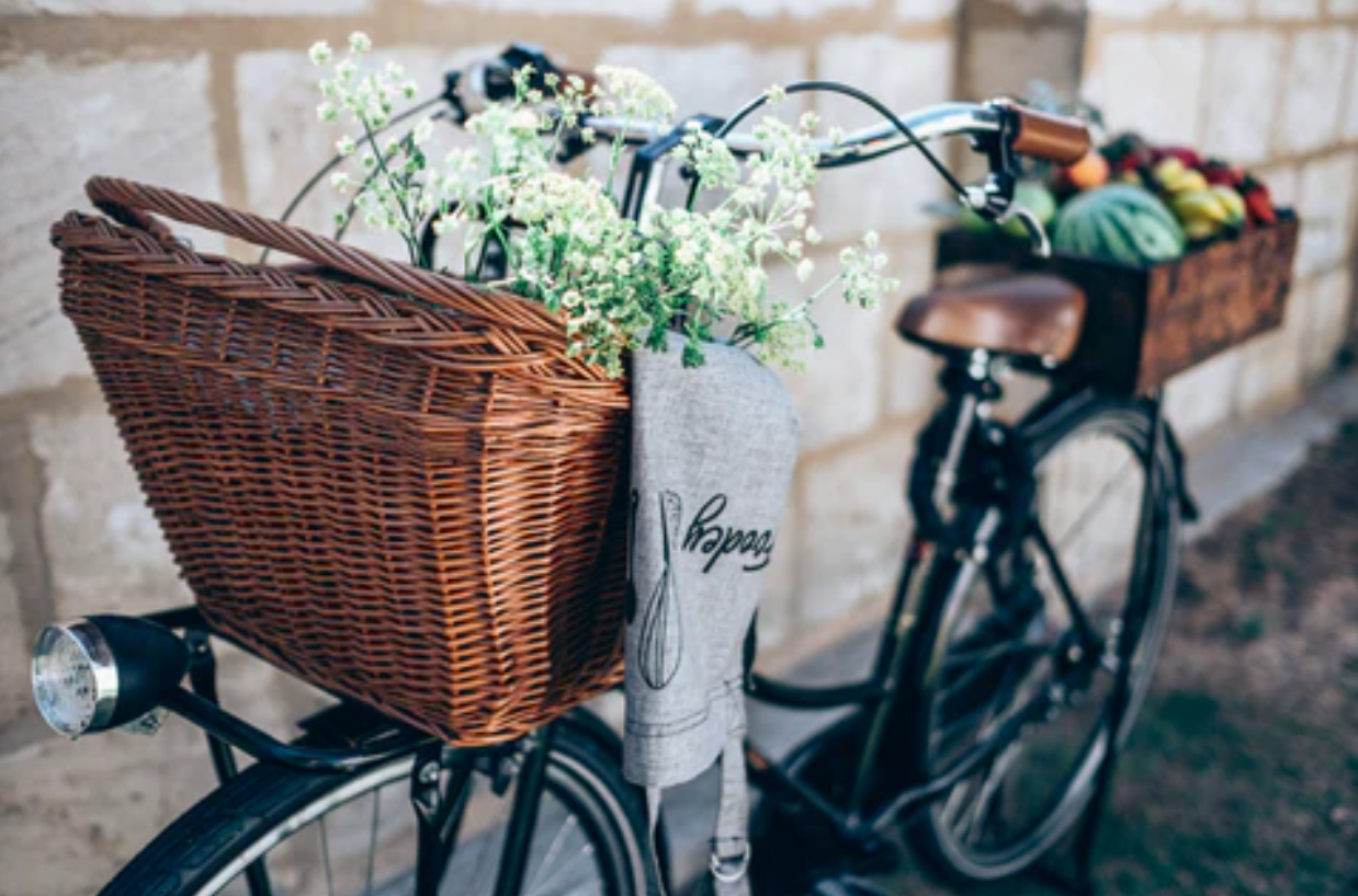 bicycle with fresh produce in a basket